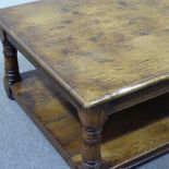 A good quality reproduction oak 2-tier low table, 4'7" x 2'8"