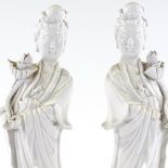 A pair of Chinese Blanc de Chine porcelain figures of women, height 38cm