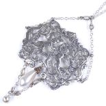 A large Victorian silver pearl and paste lavaliere pendant necklace, central pierced panel depicting