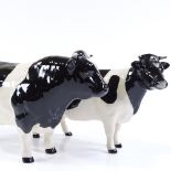 A Beswick Friesian bull and Beswick Friesian cow, boxed (2)
