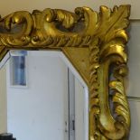 A 19th century Florentine carved and pierced giltwood-framed rectangular wall mirror, 2'5" x 2'1"