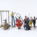 A group of die cast circus figures and playground figures