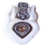 A carved banded agate pendant / bracelet panel, with grotesque figure decoration, height 41.8mm,