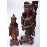 2 Chinese carved and stained wood standing figures, largest height 35cm
