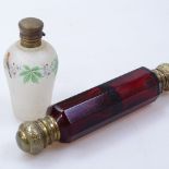 A ruby glass double-ended scent bottle, and another glass scent bottle