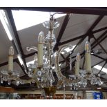 A brass-framed cut-glass 5-branch chandelier