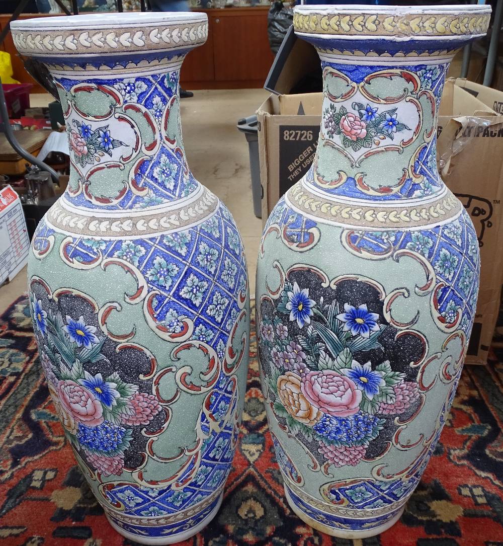 A pair of Oriental baluster vases, 24.5"