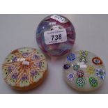 A Perthshire Millefiori paperweight, a Caithness paperweight, and another