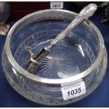 A silver-rimmed cut-glass bowl, and a silver-handled ham bone holder