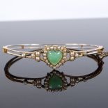 A Victorian 15ct gold green stone and pearl heart-shaped hinged bangle, with openwork body, internal