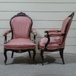 A pair of mahogany-framed fireside armchairs, with carved show wood surrounds, and ornate brass