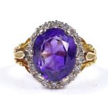 An 18ct gold amethyst and diamond cluster ring, setting height 16mm, size N, 8.9g