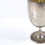 A Continental silver wine goblet, possibly French, with bright-cut chased decoration and gilt