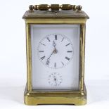 A 19th century French brass-cased carriage clock with alarm, case height 13cm