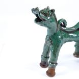 A Turkish Canakkale green glazed ceramic animal, length 18cm, height 19cm