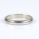 A 9ct white gold plain wedding band ring, maker's marks CPM, band width 3mm, size O, 3.1g