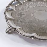 A Victorian circular silver card tray, with beaded edge and engine turned decoration, by Edward