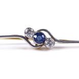 An 18ct 3-stone sapphire and diamond crossover bar brooch, length 51.1mm, 4.3g