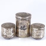 An Egyptian 3-piece unmarked silver jar set, with engraved river scenes, largest height 9cm, 8.3oz