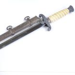 A German Army dagger, white composition grip, maker Tiger Solingen, nickel plate scabbard, overall