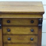 A Victorian mahogany Wellington chest of 6 drawers with carved mounts, width 53cm, height 89cm