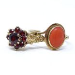 A 9ct gold coral ring, size M, together with a 9ct garnet flower ring, size O, 3.7g total (2)