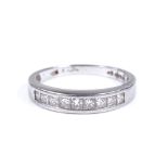 A platinum and diamond half eternity band ring, Princess-cut diamond content approx 0.5ct, setting