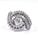 An unmarked white gold diamond cluster cocktail ring, set with round brilliant and baguette-cut