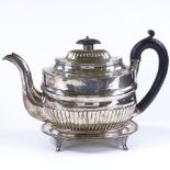 A George III 2-piece silver teapot and stand, of oval half-fluted form, by George Ashforth & Co,