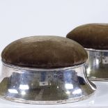 A pair of large circular silver pin cushions, with removable lids, by George Nathan & Ridley