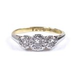 An 18ct gold 3-stone diamond ring, setting height 5.6mm, size L, 2.9g