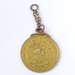 A South Africa 1896 1/10th oz Krugerrand gold coin, on gold pendant mount, 4.4g