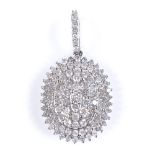 A 9ct white gold diamond cluster pendant, with diamond set bale, height excluding bale 19.2mm, 2.6g