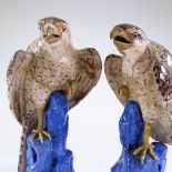 A pair of Continental glazed pottery ceramic eagles, height 48cm, both A/F