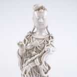 A Chinese Blanc de Chine porcelain figure of a woman, height 25cm in original silk-lined cedar box
