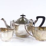 A 3-piece silver tea set, of creased oval form, with gilt interiors, by Barker Brothers Silver