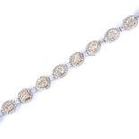 An extremely fine quality 18ct white gold diamond line bracelet, set with 4 pear-cut diamonds, 5