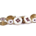 An unmarked gold ruby, diamond and mother-of-pearl gentleman's dress set, comprising pair of