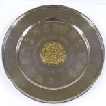 A circular silver limited edition commemorative plate, authorised by the College of Arms, on the