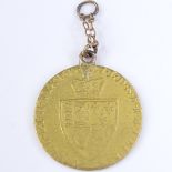 A George III gold guinea, on gold pendant mount, 8.5g