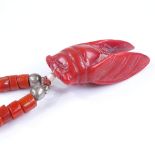 An Antique coral bug pendant necklace, with coral bead chain, pendant length 52.6mm, necklace length