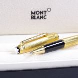 A Mont Blanc Classique gold plated solitaire ballpoint pen, cased