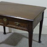 A Georgian oak side table, with single panel fronted frieze drawer, turned legs and pad feet, 3' x