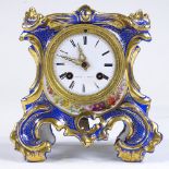 A 19th century French gilded porcelain-cased mantel clock, enamel dial signed Laine of Paris, with