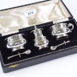 A 3-piece sterling silver cruet set, with blue glass liners, in J Boseek & Co Ltd of Calcutta