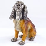 A painted and silvered metal figure of a Spaniel, height 20cm