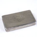 An Antique Continental silver snuffbox, with engine turned decoration and gilt interior, length