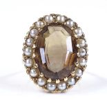 A large 9ct gold smoky quartz and seed pearl oval cluster ring, setting height 24.5mm, size Q, 9.5g