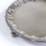 A small circular silver card tray, by J Parkes & Co, hallmarks London 1927, diameter 16cm, 6.5oz