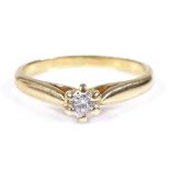 An unmarked gold solitaire diamond ring, diamond approx 0.15ct, settings test as 18ct, setting